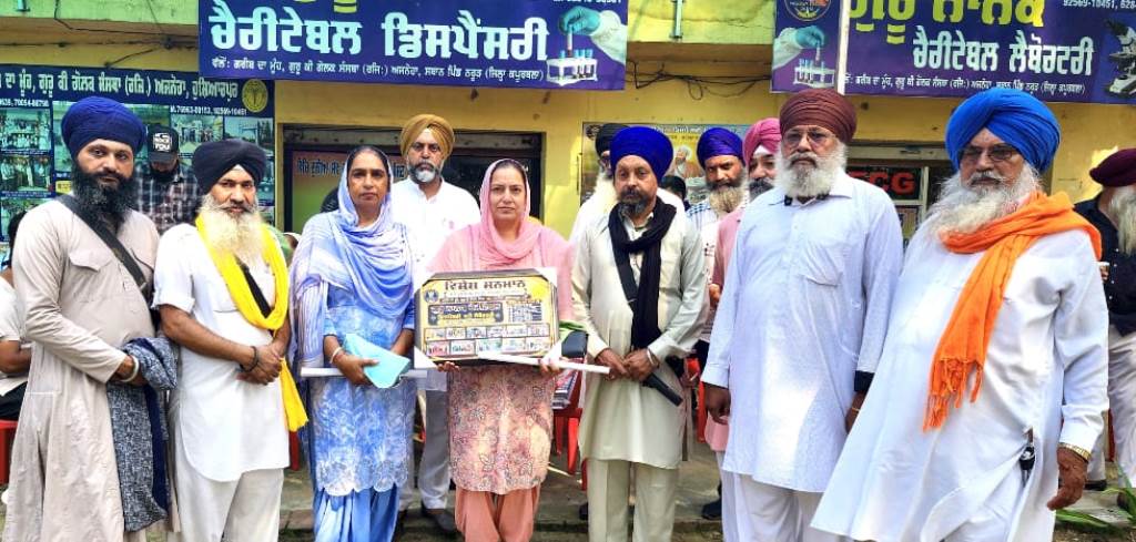 The organization honored the Sarpanch of village Ajnoha Rajwinder Kaur at the Guru Nanak Charitable Dispensary and Laboratory